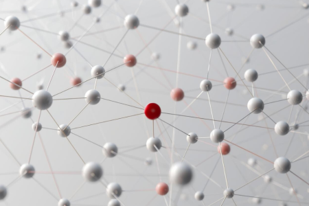 A web of interconnected nodes representing packages and dependencies. The nodes are color-coded in neutral tones, a few in red to show compromised or risky packages. Lines connecting nodes show the deep dependency chains typical of npm. npm supply chain security